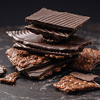 Stack of Chocolate treats sitting on black marble from Fatu-mmm Catering