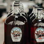 several bottles of Maple Syrup from Harvey Martin Farm