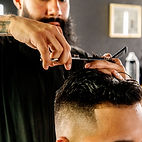 Hairstylist giving a mens cut at Waterloo Quick Cuts 
