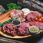 a selection of meats on a platter by Gerber Meats 