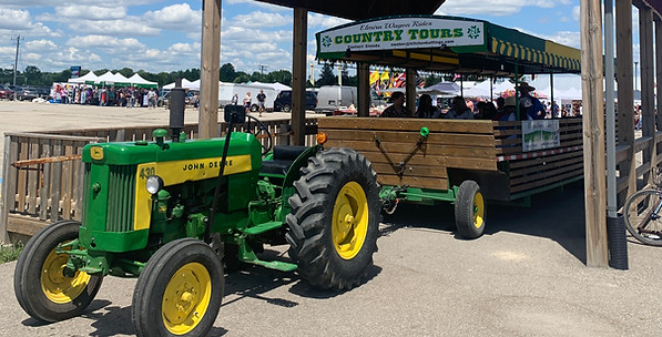 Elmira Wagon Rides Country Tours wag parked at St. Jacobs Famers Market preparing to depart for a tour 