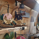 Several small wooden signs displayed on stands from Jembrook Designs 