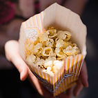 A bag of freshly popped movie theatre style popcorn from Little Prince Micro Cinema