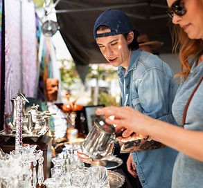 young people shopping at the open air antique fair at Market Road Antiques 