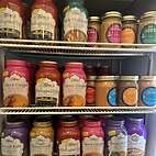 A displayed fill with jars of soups, sauces, ready to eat meals and appitizers from Classic Indian