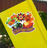 The completed collectable sticker displayed on a yellow notebook 